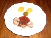 Gefülltes Schweinefilet mit Kartoffelscheiben in Portweinsoße - Rezept