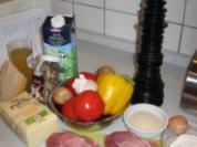 Schweinekotelette paniert, mit fr. Paprika-Tomatengemüse + gebr.Steinpilzpolentamedaillons - Rezept