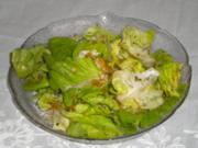 Ragout von Kaninchen mit Kartoffelstock und Salat - Rezept
