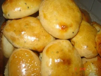 Rezept: Teigtaschen mit Schwarzkümmel und Kartoffel-Hähnchen Fülle Teigtaschen mit Schwarzkümmel und Kartoffel-Hähnchen Fülle - Rezept