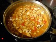 Curry-Putenstreifen mit Paprika und Champignons - Rezept