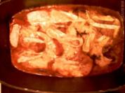Überbackene Kalbsschnitzel in Tomatensoße - Rezept