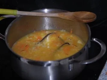 Kräuter-Knoblauch-Gambas auf vanilliertem Safranrisotto - Rezept - Bild Nr. 3