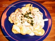 Tortellini mit einer Champignon-Sahne-Soße - Rezept