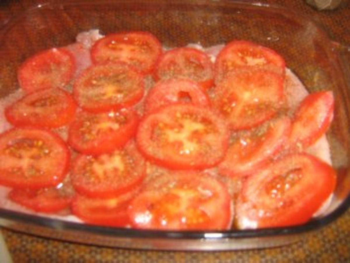 Putenschnitzelchen unter einer Tomaten-Mozzarella-Kruste - Rezept - Bild Nr. 4