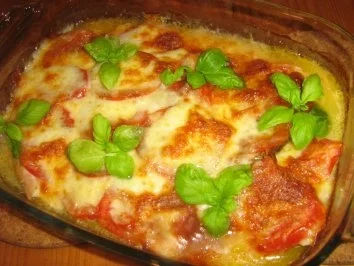 Rezept: Putenschnitzelchen unter einer Tomaten-Mozzarella-Kruste Bild Nr. 6 Putenschnitzelchen unter einer Tomaten-Mozzarella-Kruste - Rezept - Bild Nr. 6