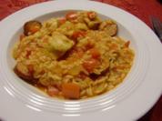 Hähnchen-Reis-Pfanne mit Schinkenwürstchen - Rezept