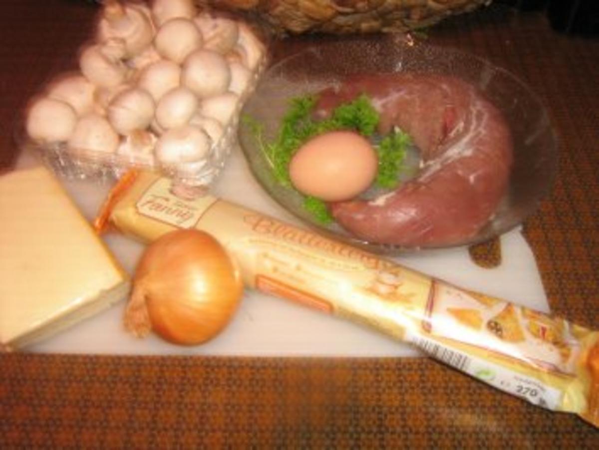 Filet mit Champignons in einem Käse-Blätterteigmantel - Rezept - Bild Nr. 2