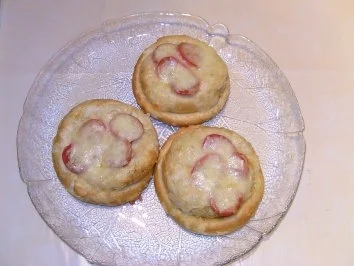 Überbackene Laugenschnecke / Laugenpizza - Rezept