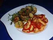 Hähnchenbruststreifen mit Paprikagemüse und Bratkartoffeln - Rezept