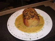 Schweinebraten mit Zwiebelkruste - Rezept