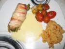 Gefüllte Putenröllchen mit geschmorten Tomaten - Rezept