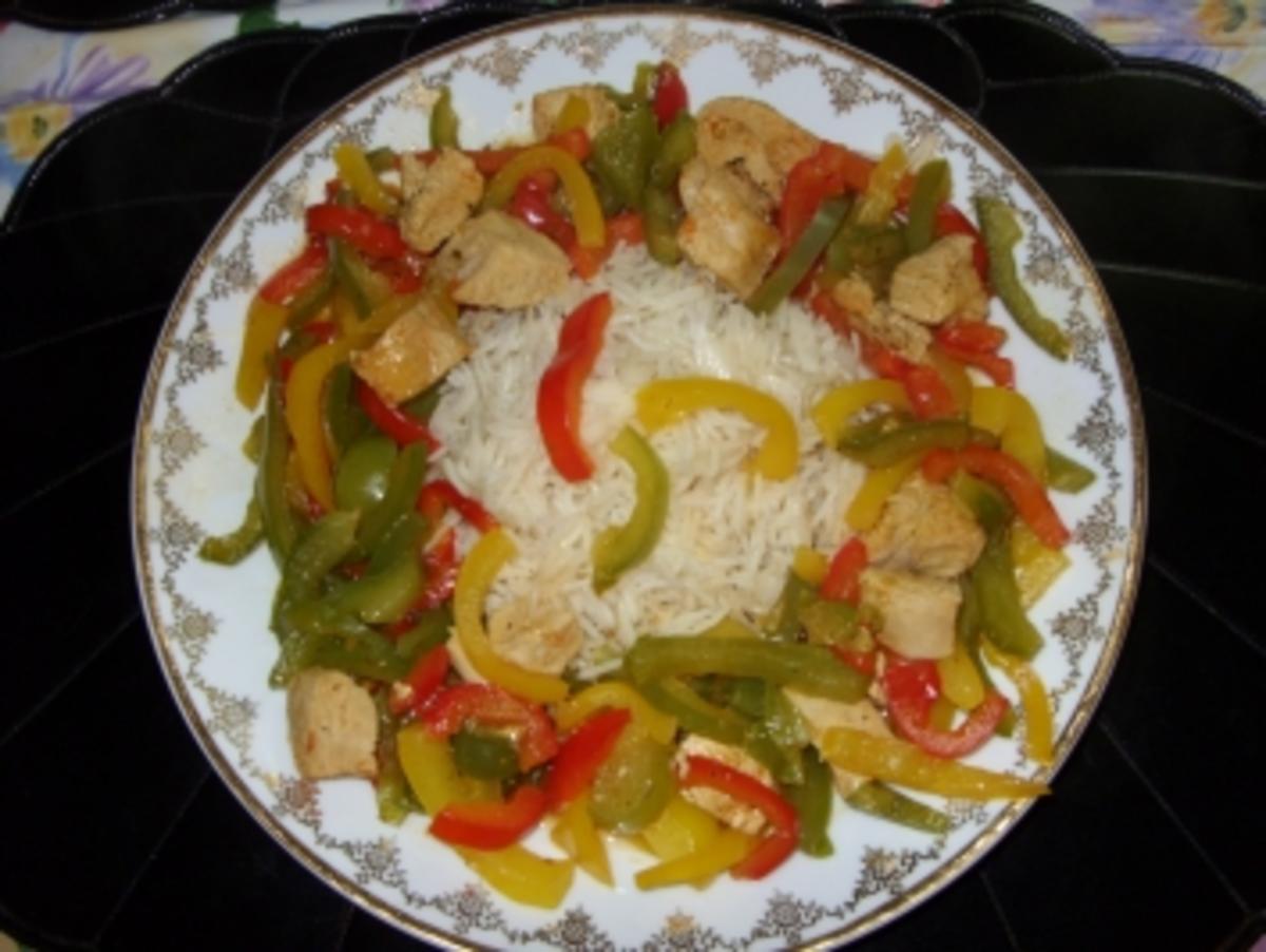 Putenschnitzel mit Paprikastreifen und Reis - Rezept - Bild Nr. 3