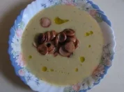 Pastinakensuppe mit Ingwer, Knobi, Frischkäse und gebr. Wienerscheibchen - Rezept