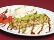 Rezept: In Orangenlikรถr eingelegte Bananenscheiben auf zartem Crรชpe mit Vanilleeis In Orangenlikรถr eingelegte Bananenscheiben auf zartem Crรชpe mit Vanilleeis - Rezept