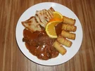 Schnitzel "naturel" mit  Rotwein-Orangen-Pilz-Sauce - Rezept