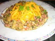 Orangen-Taglioline mit Champignon-Orangen-Sauce - Rezept