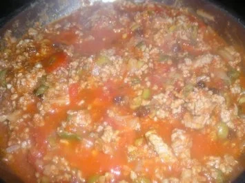 Rezept: Gefüllte Paprika spanische Art mit Tomatensauce und Reis Bild Nr. 4 Gefüllte Paprika spanische Art mit Tomatensauce und Reis - Rezept - Bild Nr. 4