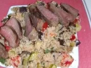 Lammlachse auf Auberginen-Couscous-Salat - Rezept