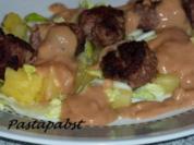 Hackbällchen an Erdnusssauce - Rezept