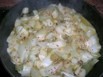 Schweinefilet in Zitronenzesten mit Baby-Möhrchen und Chicorée sowie Parmagiano-Rösti - Rezept - Bild Nr. 10