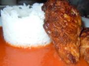 Hähnchenbrust in Kardamom-Parmesan-Hülle auf Tomatensauce und Reis - Rezept