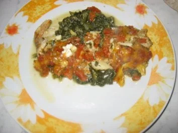 Rezept: Seelachs auf Spinatbett mit Tomatendecke Seelachs auf Spinatbett mit Tomatendecke - Rezept