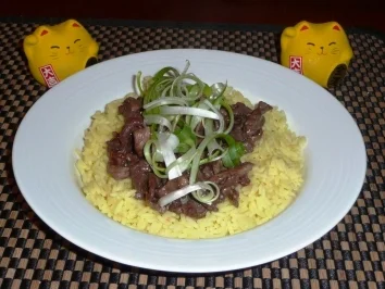 Ingwerfleisch mit würzigem Safranreis - Rezept