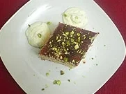 Rezept: Kokosnusskuchen mit Ouzo-Sahne und griechische Käseauswahl Kokosnusskuchen mit Ouzo-Sahne und griechische Käseauswahl - Rezept