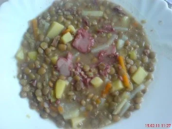 Linseneintopf mit Blutwurstscheibe - Rezept