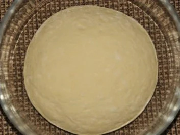 Rezept: Pizza con Rucola Bresaola e Parmigiano Bild Nr. 4 Pizza con Rucola Bresaola e Parmigiano - Rezept - Bild Nr. 4