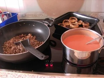 Champignons gefüllt und überbacken - Rezept