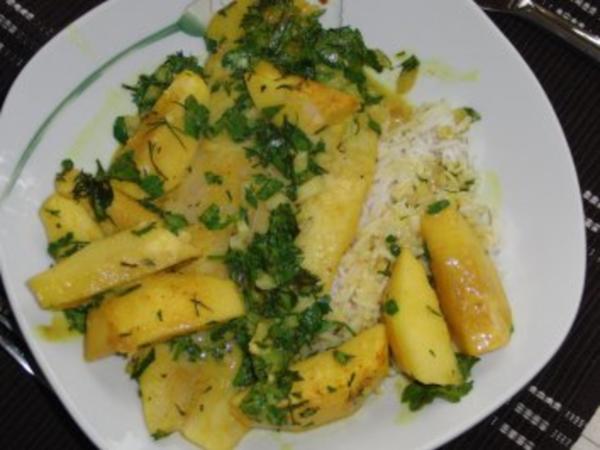 Fisch : Pangasius in Currysoße und Apfel mit viel Kräuter, serviert mit ...