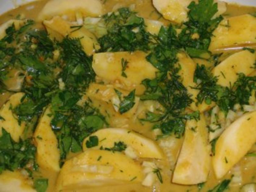 Fisch : Pangasius in Currysoße und Apfel mit viel Kräuter, serviert mit ...