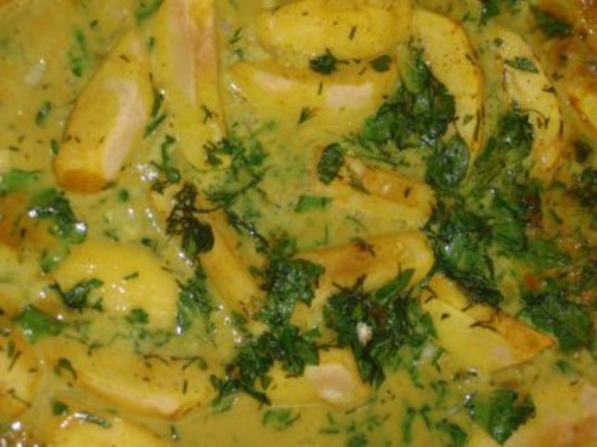 Fisch : Pangasius in Currysoße und Apfel mit viel Kräuter, serviert mit ...