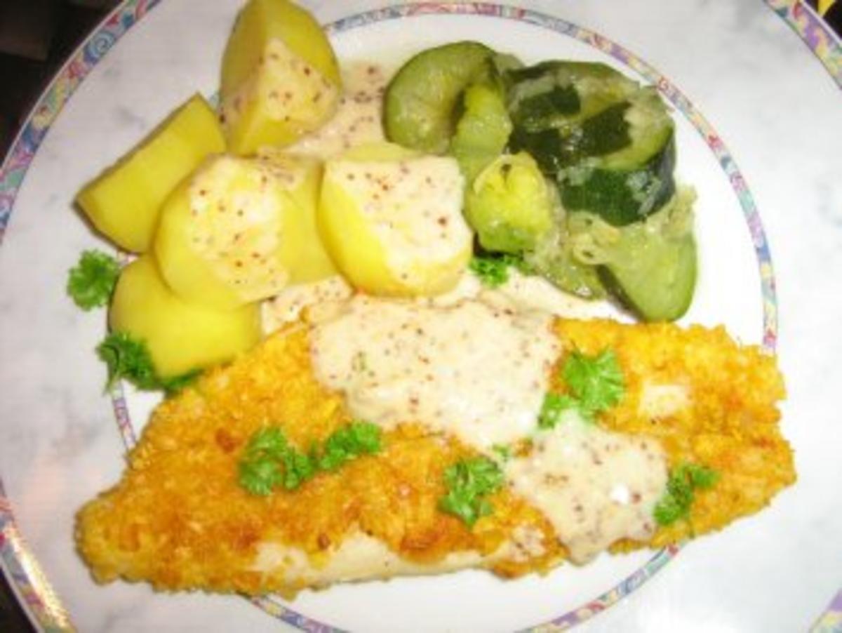Fischvariatonen in einer Knusperkruste mit Salzkartoffeln und Zuchinigemüse - Rezept