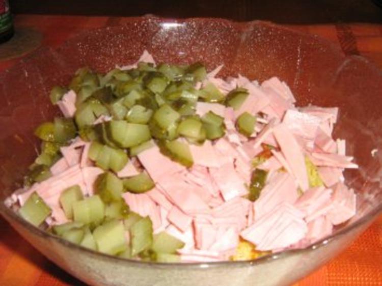 Reissalat mit Schinken, Salami und Mandarinen - Rezept - kochbar.de