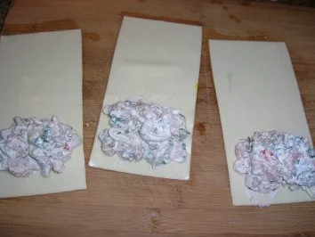 Rezept: Meeresfrüchte-Cannelloni mit Safransoße, dazu italienischer Tomatensalat Bild Nr. 6 Meeresfrüchte-Cannelloni mit Safransoße, dazu italienischer Tomatensalat - Rezept - Bild Nr. 6