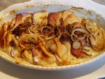 Laugenbrötchen-Gratin mit Fleischkäse - Rezept