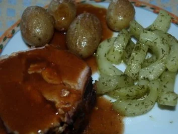 Gefüllter Putenbraten im Speckmäntelchen - Rezept