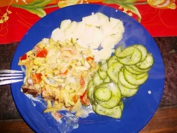 Schweinekoteletts mit Zucchini - Rezept