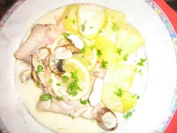 Welsfilet nach Schwarzwälder Art zubereitet  mit Petersilienkartoffeln - Rezept