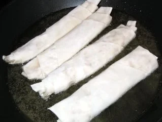 Hähnchenbrust in Tomaten-Orangensud mit Tagiatelle und Ziegenkäse-Zigarren - Rezept - Bild Nr. 11