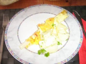 Rezept: Spargel in Schinken eingerollt mit Sauce Hollandaise und Gouda überbacken Spargel in Schinken eingerollt mit Sauce Hollandaise und Gouda überbacken - Rezept