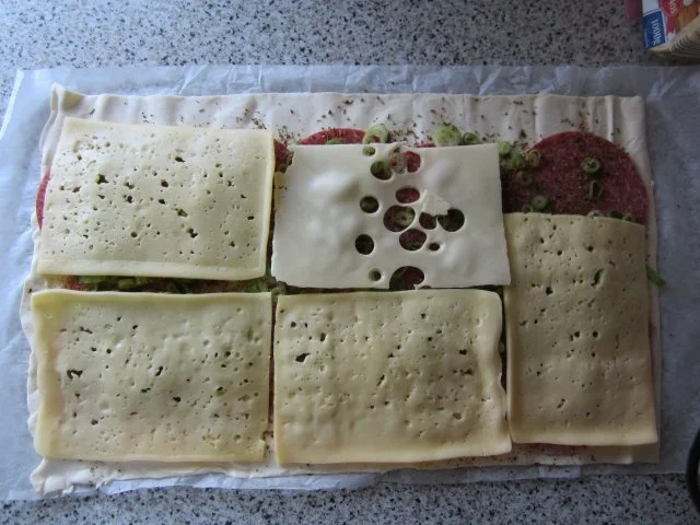 Rezept: Ratz-Fatz-Pizzaschnecken Bild Nr. 4 Ratz-Fatz-Pizzaschnecken - Rezept - Bild Nr. 4