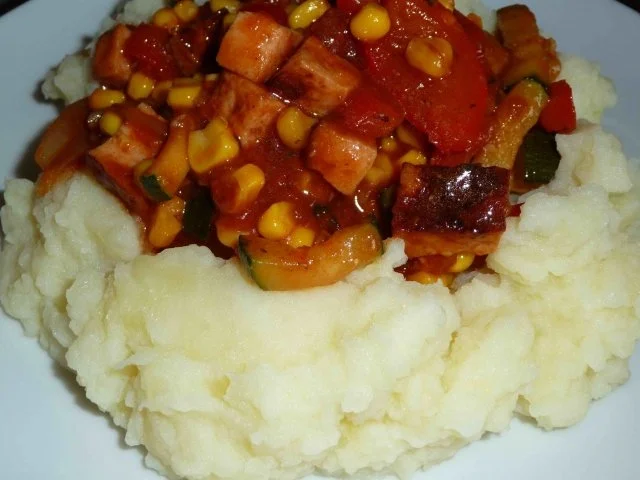 Rezept: Leberkäs-Pfanne im Kartoffelnest Leberkäs-Pfanne im Kartoffelnest - Rezept