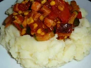 Leberkäs-Pfanne im Kartoffelnest - Rezept