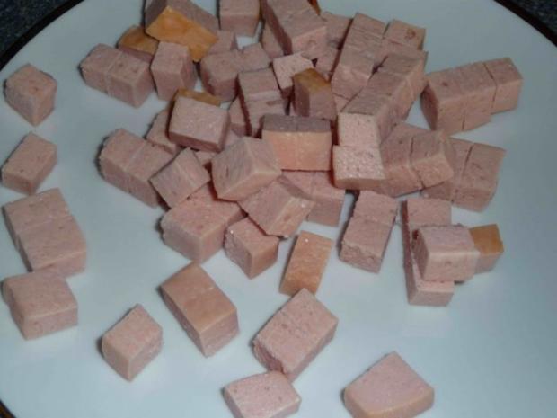 Leberkäse-Pfanne im Kartoffelnest