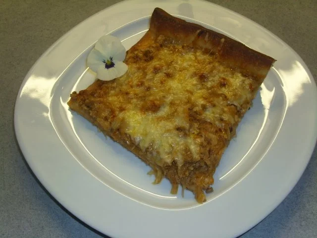 Rezept: Pizza mit Sauerkraut und Hackfleisch Pizza mit Sauerkraut und Hackfleisch - Rezept