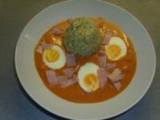 Tellergerichte: Eier in Tomatensosse und Kräuterreis - Rezept
